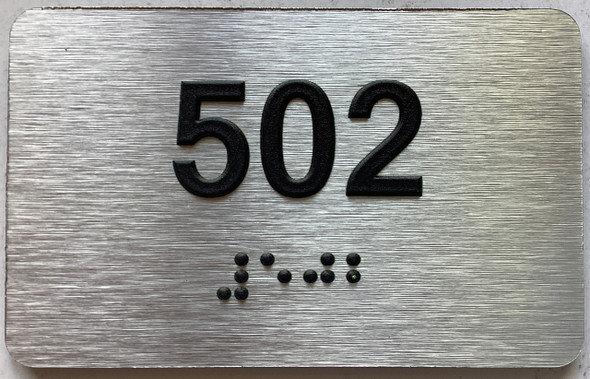 apartment number 502 sign