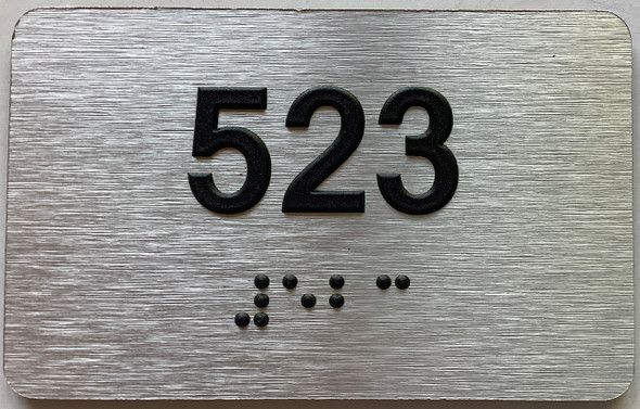 apartment number 523 sign