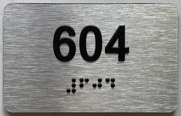 apartment number 604 sign