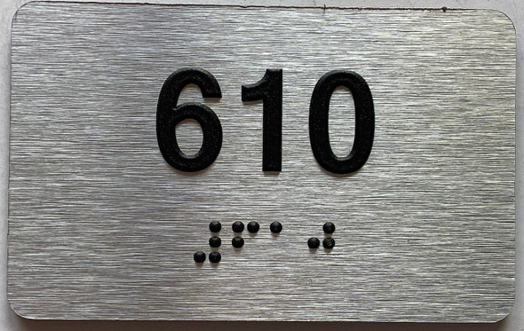 apartment number 610 sign
