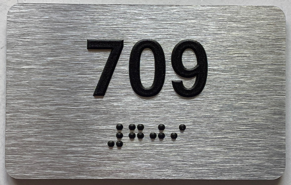 apartment number 709 sign