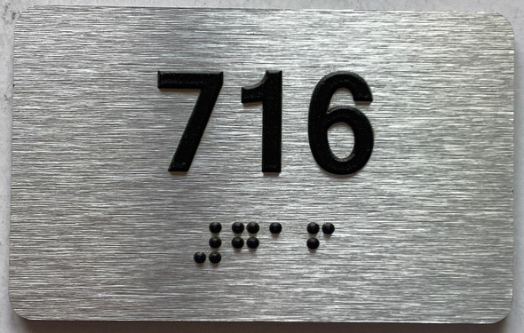 apartment number 716 sign