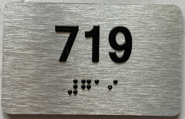 apartment number 719 sign