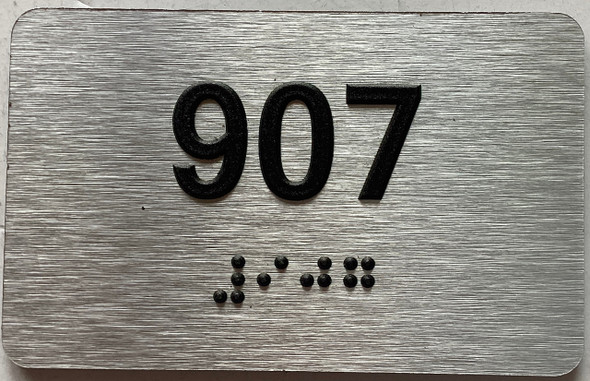 apartment number 907 sign