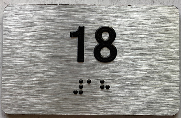 apartment number 18 sign