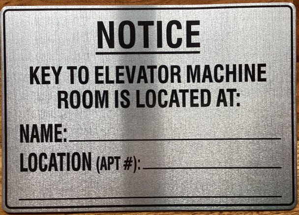 notice-key-to-elevator-machine-room-is-located-at-7x10-inch-silver-aluminum-sign.jpg