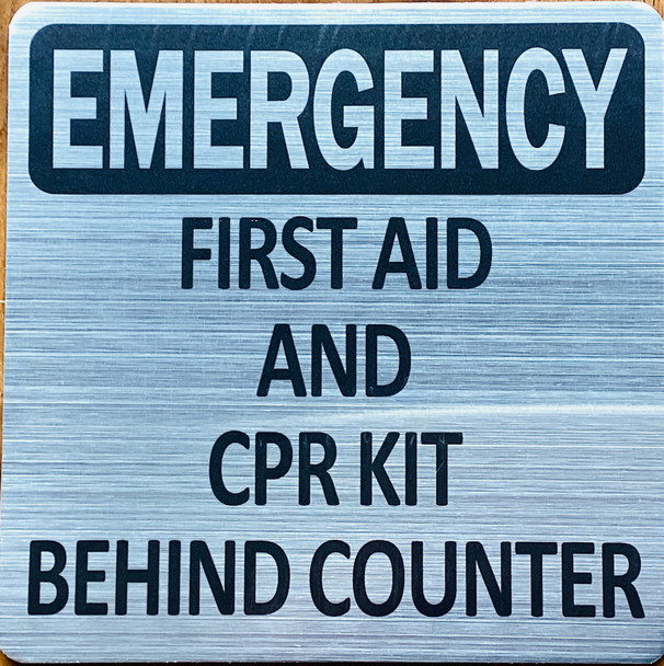 emergency-first-aid-cpr-kit-behing-counter-6-x-6-silver-aluminum-sign.jpg