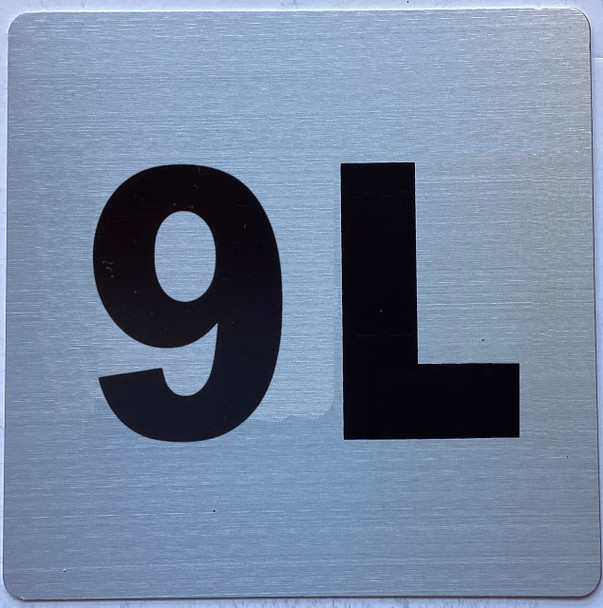 Apartment number 9L sign