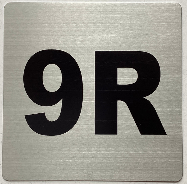 Apartment number 9R sign