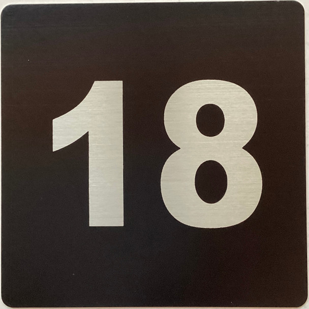 Apartment number 18 sign