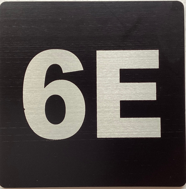 Apartment number 6E sign