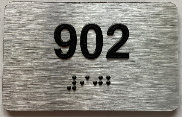 apartment number 902 sign