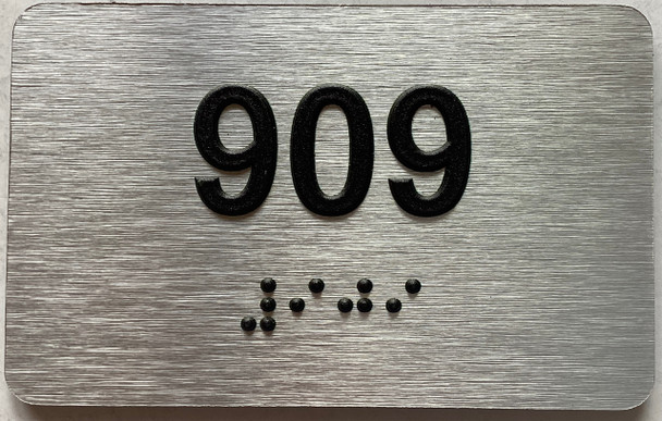 apartment number 909 sign