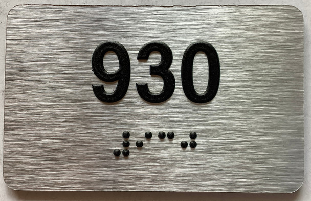 apartment number 930 sign