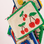 Ink + Alloy beaded clutch cherries