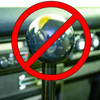 Funny illustration of a "no" symbol over a stock Original Big Shot Shifter eight ball shift knob