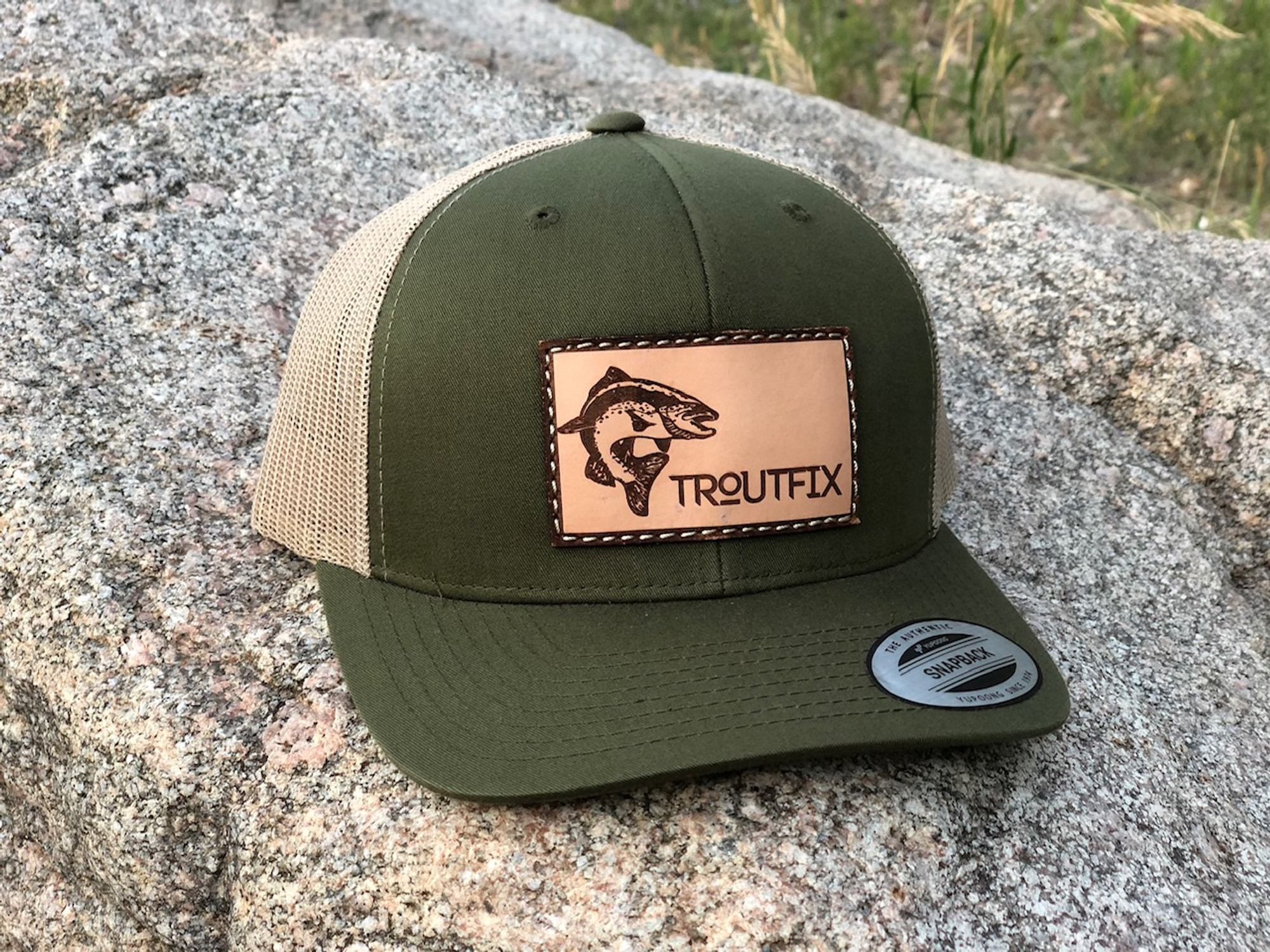 khaki leather cap