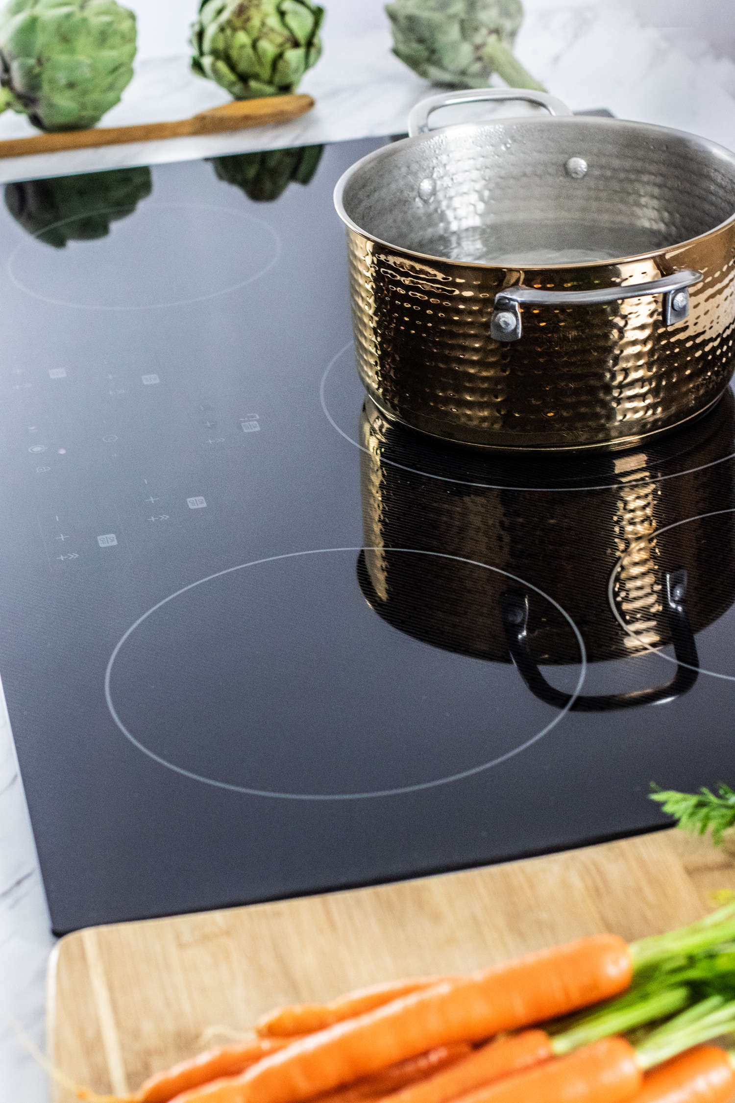 36-Inch Black  Cooktop (SDH3652DB) – pot of water on the Sharp 36”  cooktop