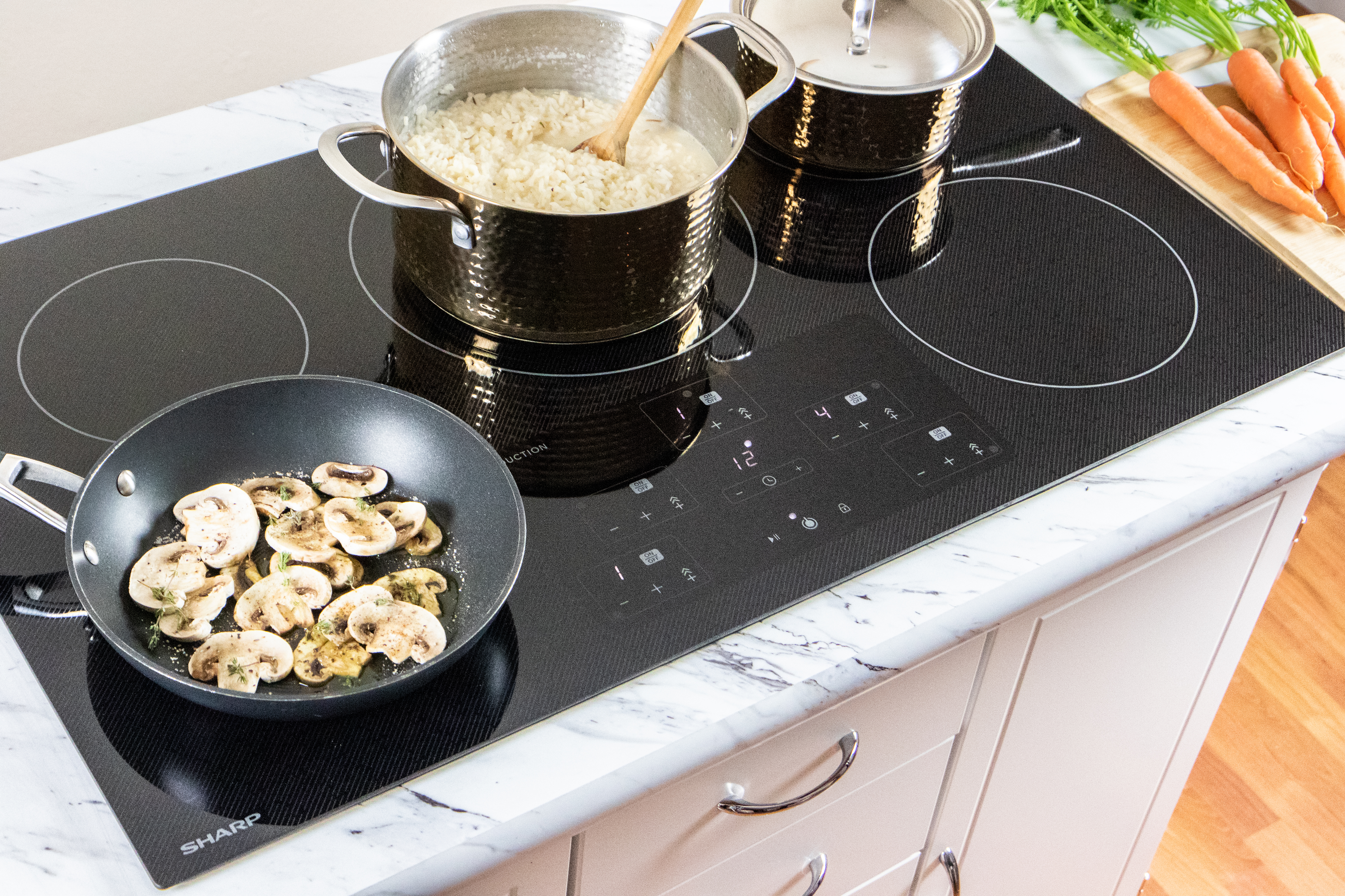 The Sharp 36” Induction Cooktop Made with Premium SCHOTT® Glass (SDH3652DB)