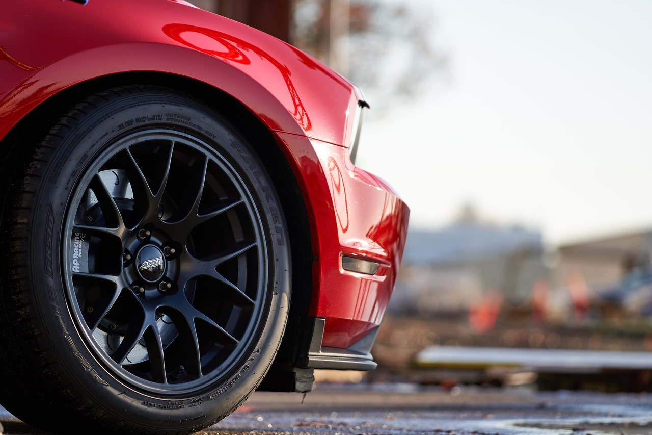 Apex 18x10" satin black EC-7 wheel on front of S197 Mustang