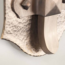  Hand-hammered pewter sconce base showing textured metalwork and geometric pyramid detailing with curved bracket design. Arts & Crafts lighting featuring historically-inspired craftsmanship and architectural accents.