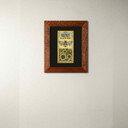  An archival print of a bee with sunflowers. It has a black mat and 2