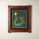  An archival print of a yellow tulip and inspirational quote with a double mat in a foursquare oak frame.