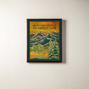  A canvas print of a heavily textured mountain and forest scene. It's in a brown float frame.