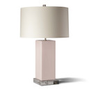  A mid-century modern table lamp featuring a sleek rectangular block base in a dusty pink glazed ceramic finish. The column base sits on a clear, square acrylic pedestal and is topped with a wide white fabric drum shade that has a subtle, light texture.