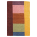  A contemporary, hand-knotted wool rug featuring a bold, asymmetric color-block design in a vibrant rainbow palette. The rug is composed of large, solid rectangular sections in burgundy, mustard yellow, dusty pink, burnt orange, sage green, and navy blue.