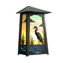  A flush mounted, art nouveau wall sconce light with a black finish, iridescent glass and a blue heron filigree.