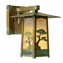  A rustic, artistic wall mounted light fixture with Monterey Cypress artwork, an aged patina finish and iridescent glass.