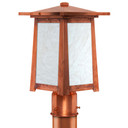  A linear Arts & Crafts post mounted light fixture with a raw copper finish and white glass.