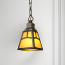  A traditional Mission, Craftsman or bungalow style light fixture shade with a metal framed body and iridescent glass. It features an arch design and has a round, 2.25