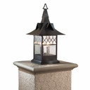  A Victorian, Gothic Revival style column mounted pier light fixture with a church window pattern, bronze finish, bubbly glass and candle bulbs.