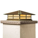  A Prairie Style column mounted pier light fixture with a window pattern, aged patina finish and warm glass.