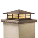  A Prairie Style column mounted pier light fixture with a window pattern, bronze finish and iridescent glass.