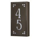  A solid brass, vertically oriented illuminated house number plaque with a two number address, a bronze finish, warm glass and corner glass accents.