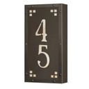  A solid brass, vertically oriented illuminated house number plaque with a two number address, a bronze finish, warm glass and corner glass accents.