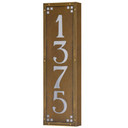  A solid brass, vertically oriented illuminated house number plaque with a four number address, an aged finish, white glass and corner glass accents.