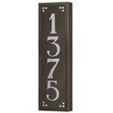  A solid brass, vertically oriented illuminated house number plaque with a four number address, a bronze finish, white glass and corner glass accents.