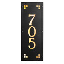 A solid brass, vertically oriented illuminated house number plaque with a three number address, a satin black finish, warm-toned glass and corner glass accents.