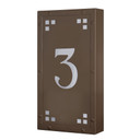  A solid brass, vertically oriented illuminated house number plaque with a single number address, a smooth bronze finish, white glass and corner glass accents.