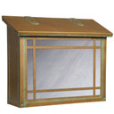  A large, Mission style mailbox with a linear border pattern, aged finish and white glass.