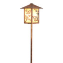  An artistic garden lantern on a post with a raw copper finish, butterfly artwork and golden glass.