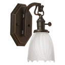  A solid brass Arts & Crafts or Craftsman sconce wall lantern with a hexagonal plate, turn key socket and a Victorian, white glass shade. The fixture has an oil rubbed bronze finish.