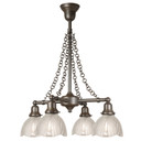  A reproduction Craftsman style bungalow chandelier light fixture with four lights on linear stems and decorative draped chain. It has am oil-rubbed bronze finish and scalloped, frosted glass Art Deco style shades. The lanterns are aimed downward.