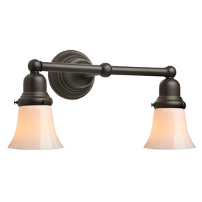  A reproduction Craftsman style bungalow two-light bathroom vanity fixture. It has an oil-rubbed bronze finish and bell shaped, milky-white glass shades.