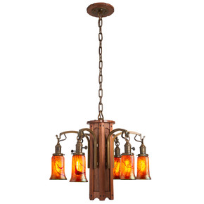  An Arts & Crafts style chandelier with a tall wood body featuring rounded corners and ebony accents. Four lanterns emerge from the body with turn key sockets, an aged brass finish and illuminated, trumpet shaped blown glass cherry blossom shades.