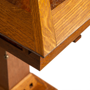  Corner detail of lamp shade showing traditional craftsman joinery techniques with quarter-sawn oak framework and amber mica panel construction methods.